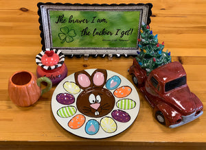 St. Pat's plate, Valentine box, pumpkin mug, Easter deviled egg tray and truck with light up Christmas tree. 